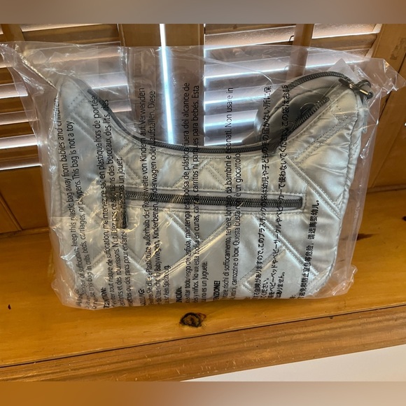 NWT Lug Curtsy Mini Crossbody Shoulder Purse Metallic Silver - Picture 7 of 8